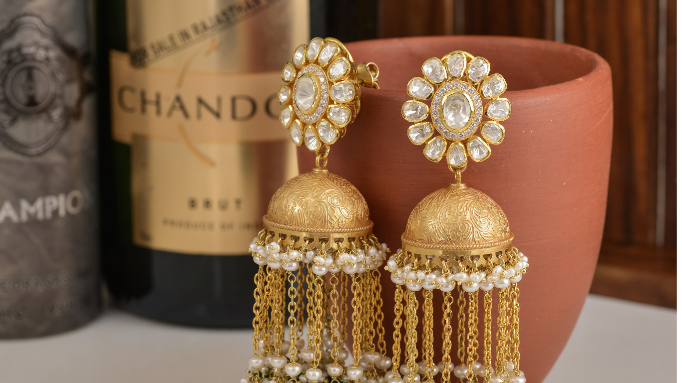 a Pair of Gold and Diamond Earrings